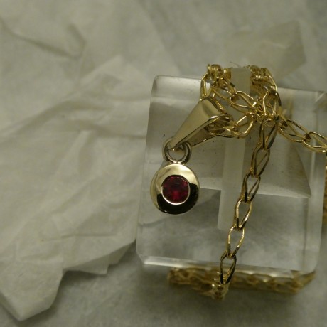 superior-bright-red-ruby-9ctgold-pendant-20589.jpg
