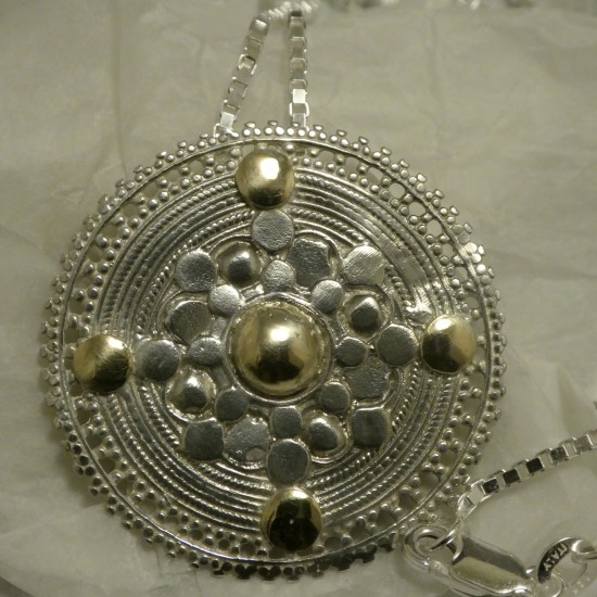 silver-sun-symbol-plus9ctgold-40353.jpg